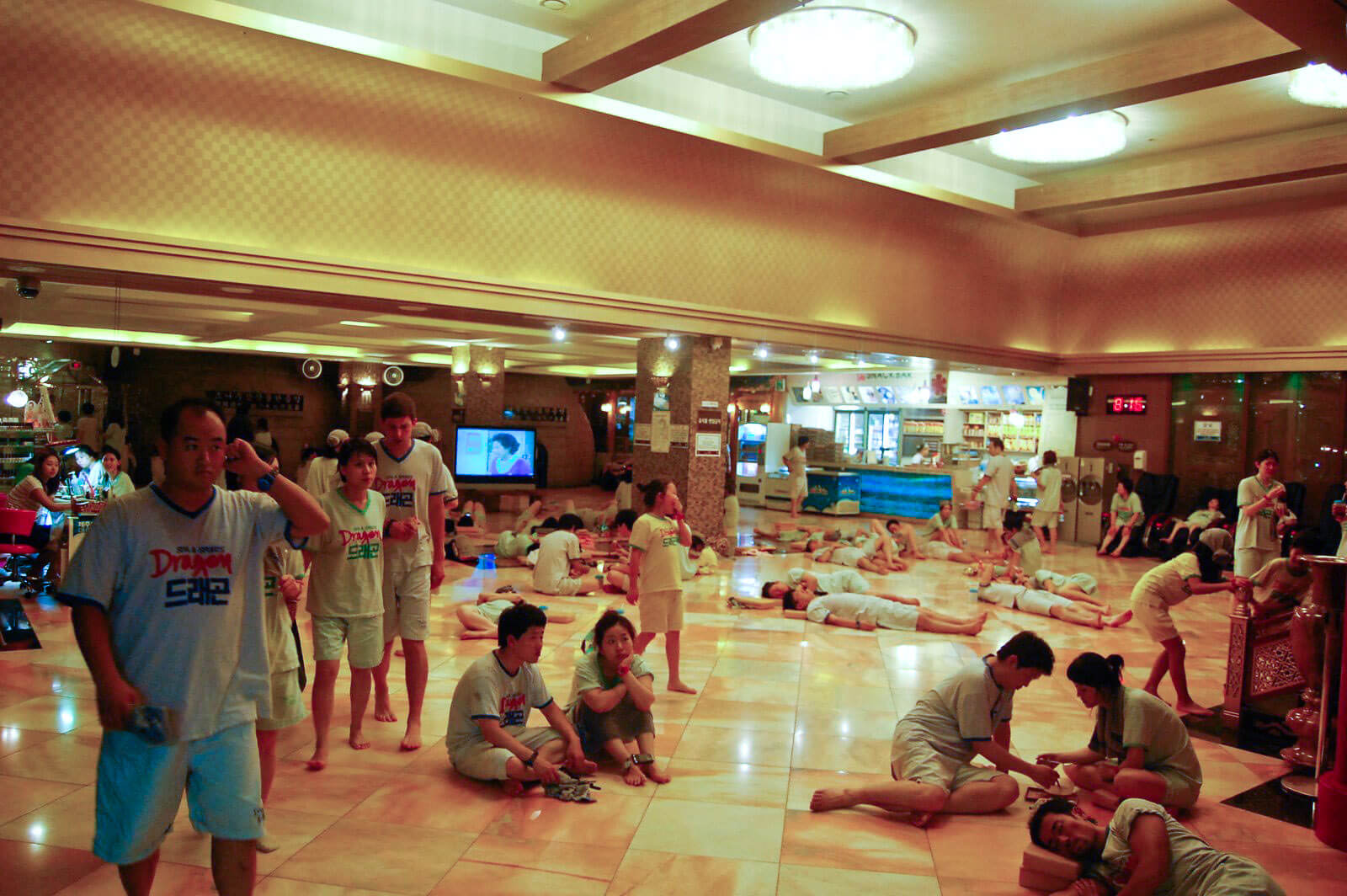 Visitors relax in the public baths, Korean, enjoy the cozy atmosphere with leisure activities.